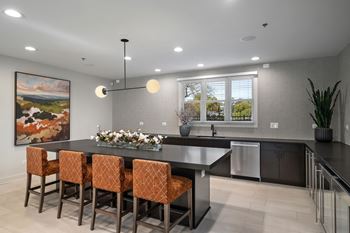 Entertainment kitchen with resident gathering lounge